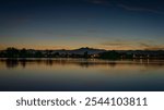 sunset over Rocky Mountains with Longs Peak and Windsor Lake in Colorado