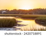 sunset over the salt marsh of pawleys island soun