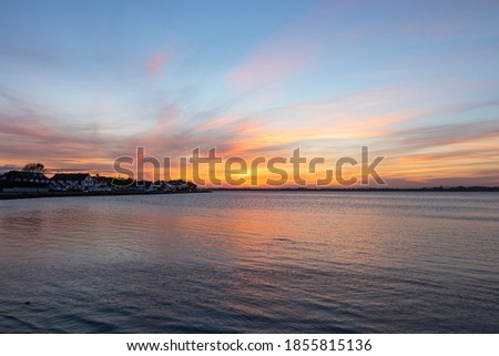 Sunset over the sea at Malahide