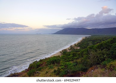 Sunset Over The Sea Off The Captain Cook Highway Between Cairns And Mossman In Far North Queensland, Australia