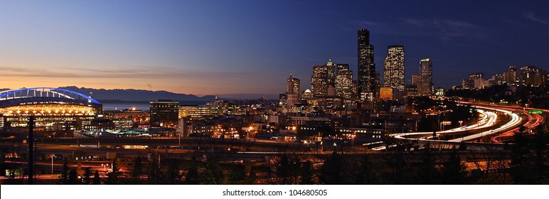 Sunset over the Seattle skyline, Puget Sound, and the Olympic Mountains.