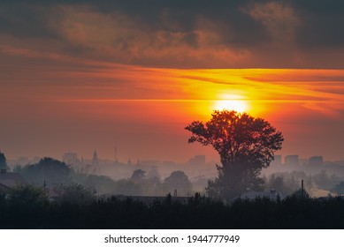 Sunset Over A Smoky City
