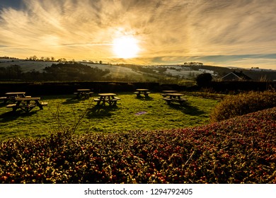 Sunset over some picnic tables in the glorious Derbyshire peak district national park, Empty tables on a frosty cold January evening at sunset - Powered by Shutterstock