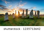 Sunset over the stone circle at Callanish on the Isle of Lewis in Scotland