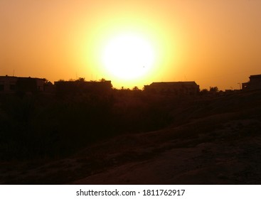 The Sunset Over A U.S. Military Base In Tikirt, Iraq.