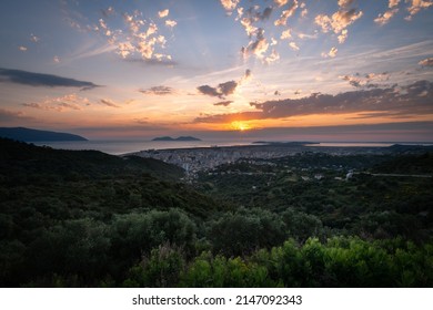 Sunset Over Vlora City With Sazan Island In Horizon.