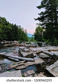 A Sunset Over The Wildcat Falls In New Hampshire.