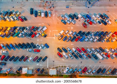 Sunset Overhead View Of A Full Parking Lot