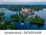 Sunset panorama of Olavinlinna castle in Savonlinna, Finland.