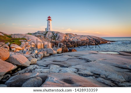 Sunset at Peggy's Cove Light House in Nova Scotia