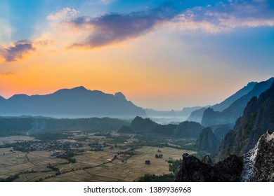 Sunset At Pha Ngeun Viewpoint Vang Vieng, Laos. That Give A Great Understanding Of The Layout Of The Town And A Broad Perspective Of The Vast Landscape Surrounding The Town.