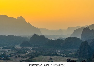 Sunset At Pha Ngeun Viewpoint Vang Vieng, Laos. That Give A Great Understanding Of The Layout Of The Town And A Broad Perspective Of The Vast Landscape Surrounding The Town.