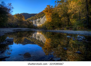 Sunset photo during the autumn as the trees change color at Roark Bluff in Steel Creek Campground along the Buffalo River located in the Ozark Mountains, Arkansas.  - Shutterstock ID 2219285067