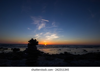 Sunset with Pile of Rocks