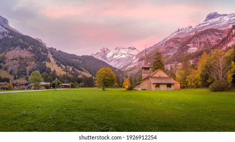 Sunset Pink Snow Swiss Alps Mountains Panorama And St. Mary Church, Kandersteg, Switzerland