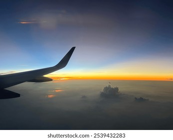 sunset from a plane window (outside temperature -41 degrees celsius, altitude close to 11 km)