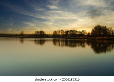 Sunset at the pond during the beginning of the spring, Meiseldorfer Teich, Lower Austria, Austria