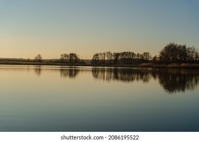 Sunset at the pond during the beginning of the spring, Meiseldorfer Teich, Lower Austria, Austria