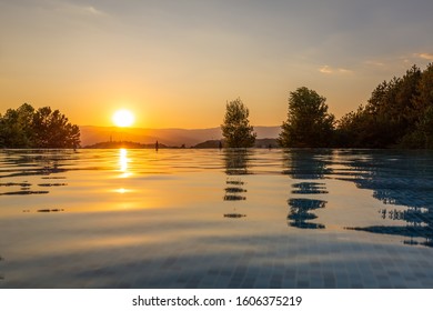 Sunset at the pool with trees