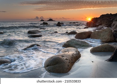 Sunset at Porth Nanven Beach in Cot Valley near Penzance in Cornwall