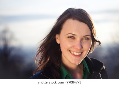 Sunset Portrait Of A Pretty Confident Young Woman