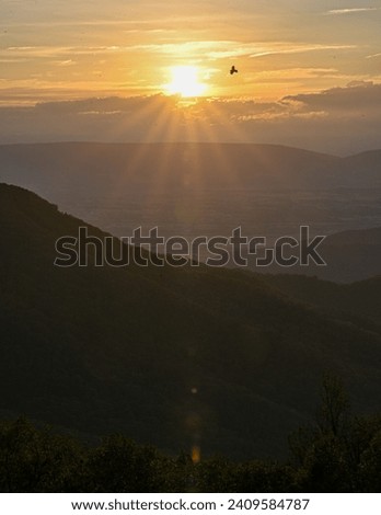 Sunset with rays of the sun over the Blue Ridge Mountains in Shenandoah National Park on Skyline Drive 