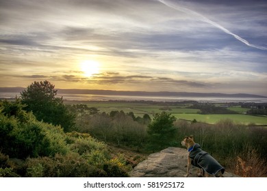 Sunset at Red Rock Heswall Wirral UK looking over the Dee estuary to North Wales