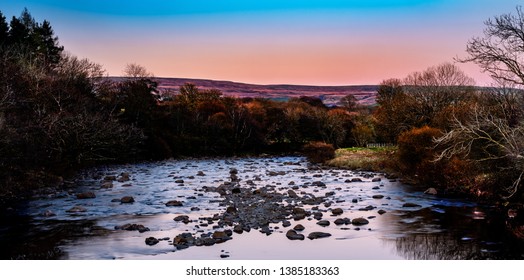 Sunset Red-Hour Photo Of River Tees At Foot Of High Force Waterfall, Forest-in-Teesdale, North Pennines, Yorkshire, England, UK