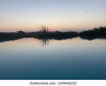 sunset reflected in the pool