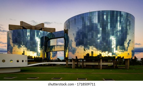 Sunset Reflecting The Brazilian National Congress During The Days Of Social Isolation In The Windows Of The Republic Attorney General (PGR E MPF). Brasilia Brazil. April 2020 