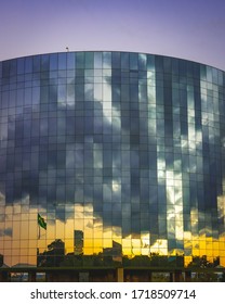 Sunset Reflecting The Brazilian National Congress During The Days Of Social Isolation In The Windows Of The Republic Attorney General (PGR E MPF). Brasilia Brazil. April 2020 