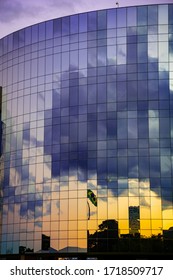 Sunset Reflecting The Brazilian National Congress During The Days Of Social Isolation In The Windows Of The Republic Attorney General (PGR E MPF). Brasilia Brazil. April 2020 