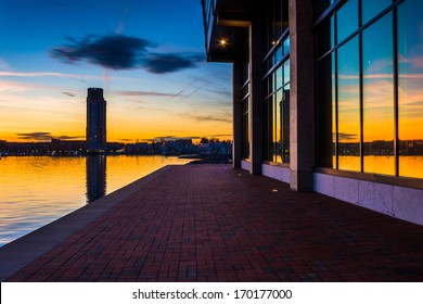 Sunset reflecting in a building on the waterfront in Fells Point, Baltimore, Maryland.