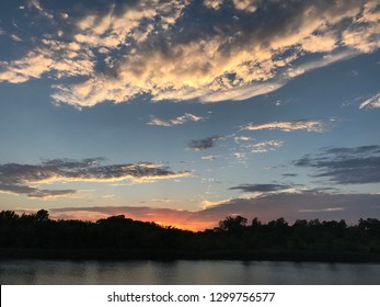 Sunset Reflecting Off Lake In Grand Prairie, Texas