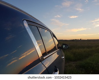 Sunset reflection in the car 
