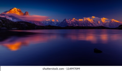 Sunset reflection in a lake in the Mont Blanc Mountains - Powered by Shutterstock