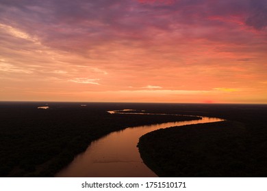 Sunset Reflection Over The Cuiaba River, Pantanal, Brazil  