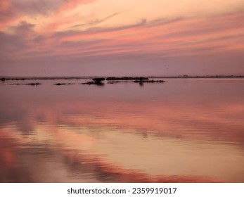 Sunset Reflection Of Sky In Water