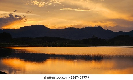 sunset with reflection in the water