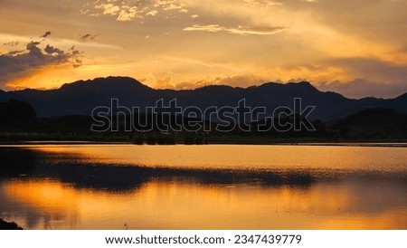 sunset with reflection in the water