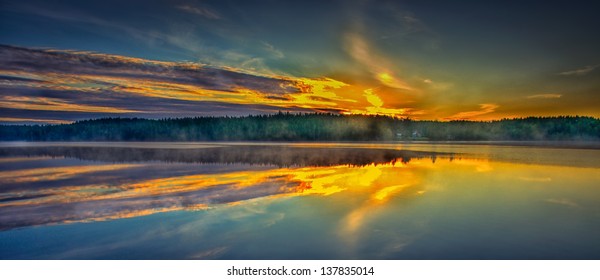 sunset with reflections in the lake