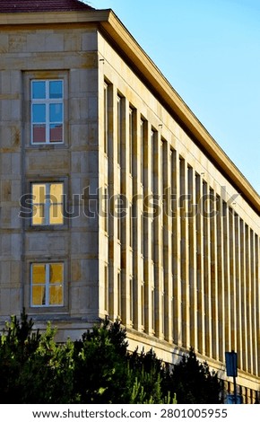 Sunset reflections on the facade of Wroclaw University of Science and Technology building