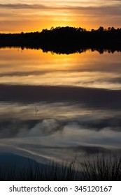 Sunset with reflections on the lake