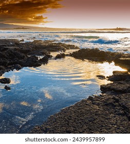 Sunset Reflections on Tide Pools on Giada's Beach, Hawaii Island, Hawaii, USA