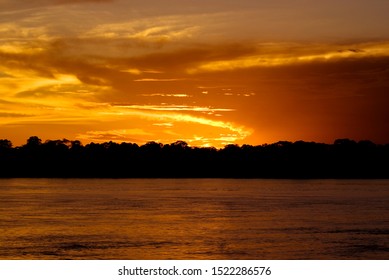 Sunset At Rio Negro Amazonian Black River