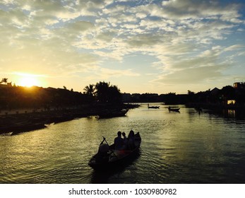 sunset and  river boat