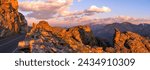 Sunset at Rock Cut - A panoramic sunset view of Trail Ridge Road at Rock Cut, with Longs Peak (14,255 ft) towering in background, on a calm Summer evening. Rocky Mountain National Park, Colorado, USA.