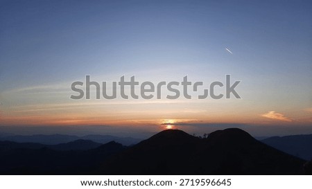 Sunset with the rocket trail
