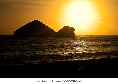 Sunset with rocks in the background