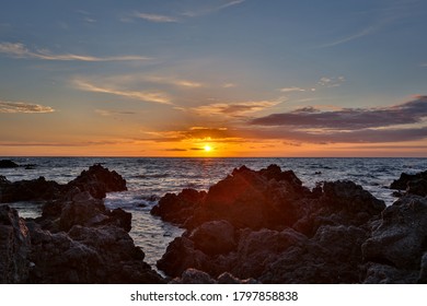 Sunset With Rocky Shoreline In South Kohala, Hawaii 